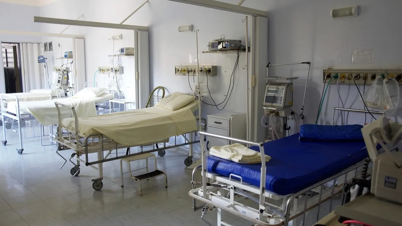 Hospital ward with beds and medical equipment