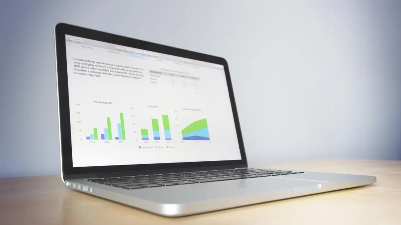 Laptop showing bar and area charts