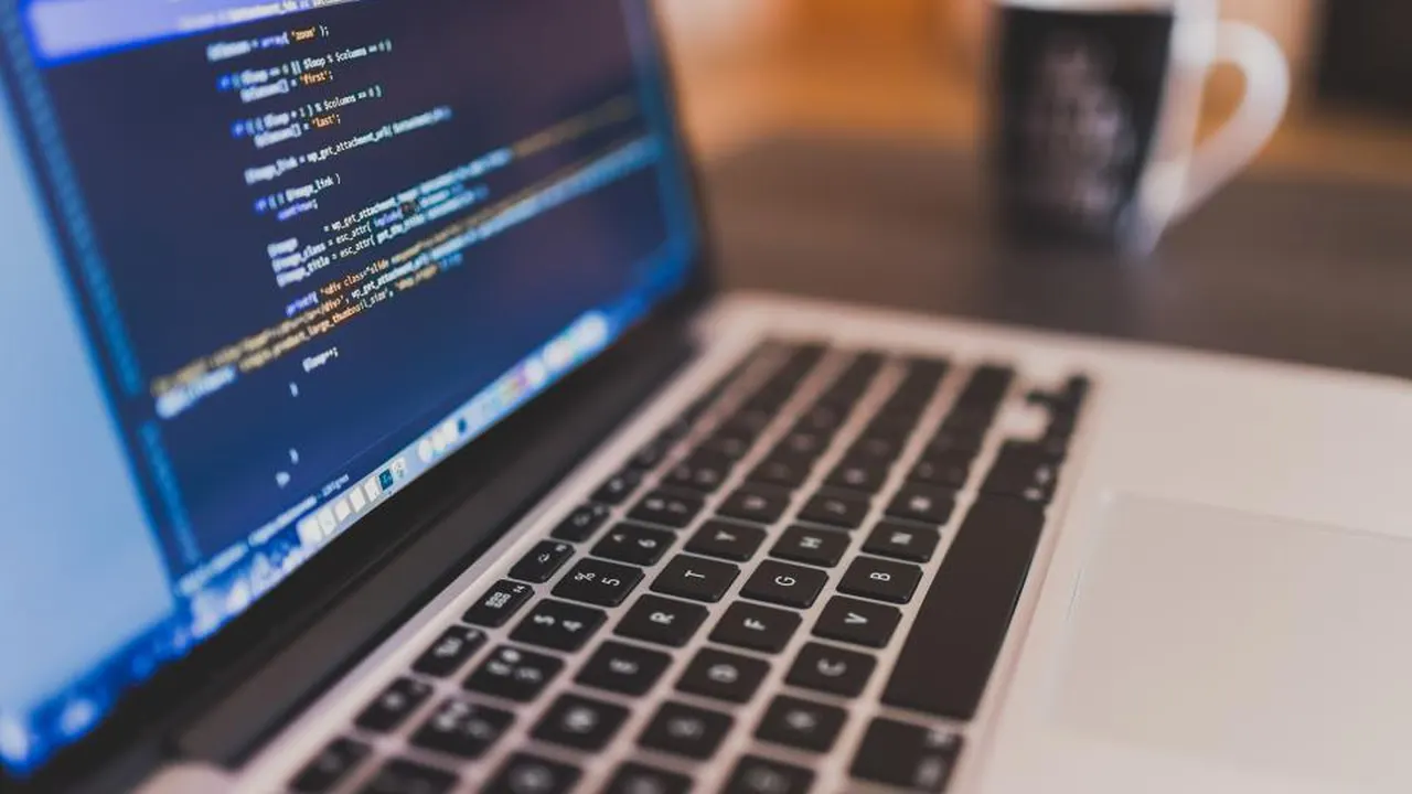 Laptop screen with code in an editor